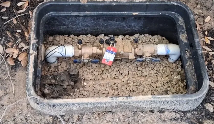 Backflow preventer assembly with test valves and gauge connections during backflow preventer testing in surprise, az