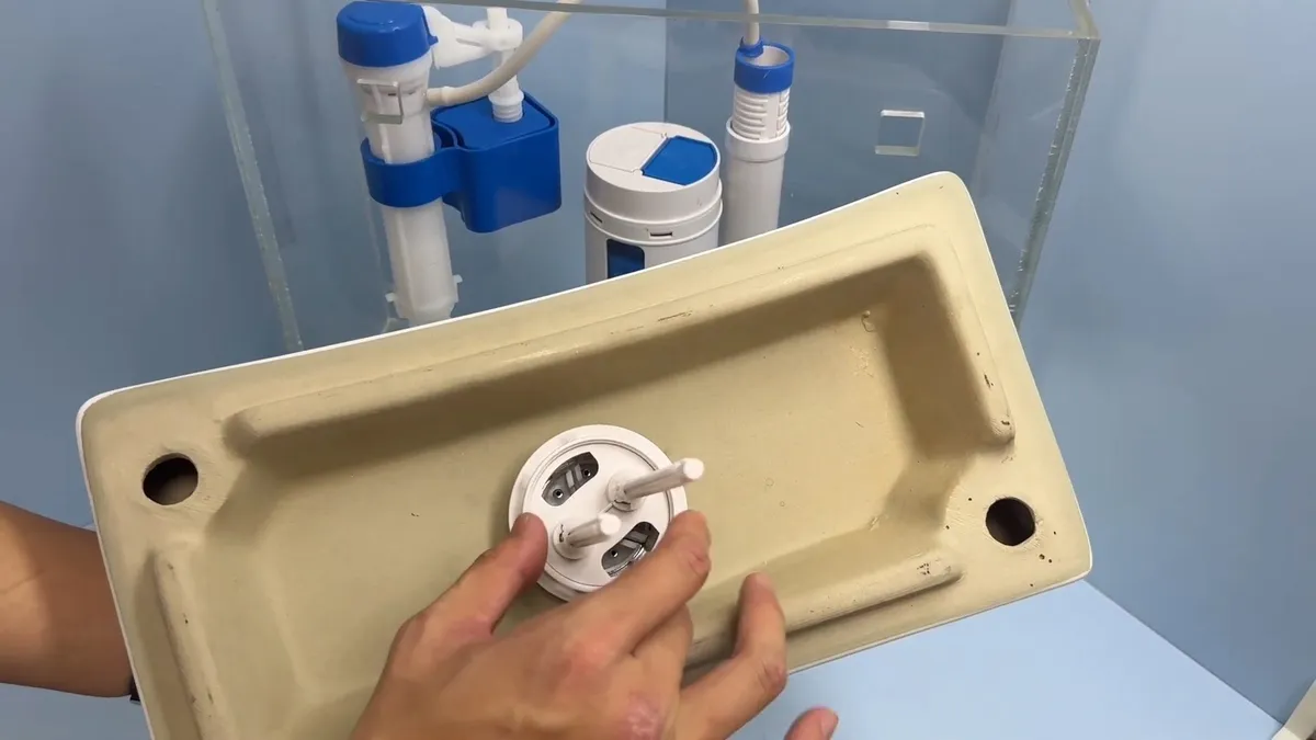 Toilet tank repair parts with fill valve and flapper components during toilet repair & replacement in surprise, az, with focus on valve toilet repair parts components